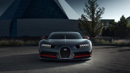 Sleek Bugatti Chiron Marveling at Twilight Shadows wallpaper