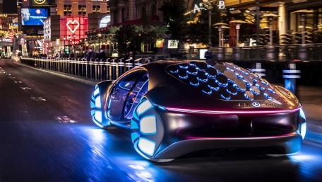 Futuristic Car Gliding Through Neon Streets wallpaper