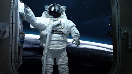 Astronaut Exploring the Infinite Cosmos wallpaper