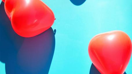 Hearts Floating on a Bright Blue Surface wallpaper