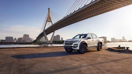 Sleek Pickup Under a Modern Bridge wallpaper