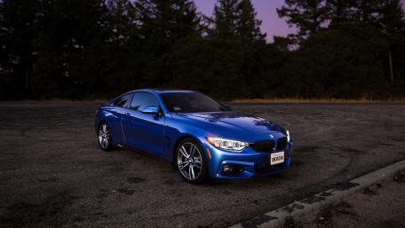 Sleek Blue BMW at Dusk wallpaper