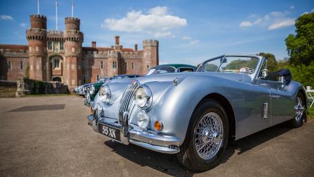 Classic Silver Convertible by Historic Castle Entrance wallpaper