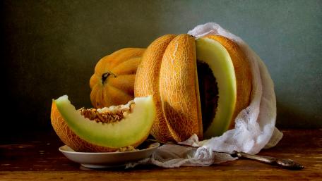 Melon Delight on a Rustic Table wallpaper