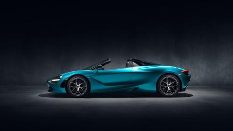 Sleek McLaren 720S in Vibrant Aqua Shade wallpaper