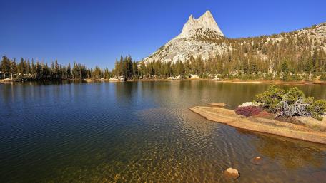 Majestic Mountain Reflected in Tranquil Waters wallpaper