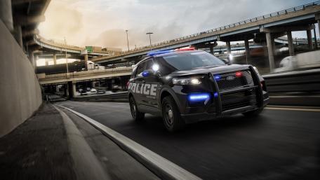 Speeding into Action with a Police SUV wallpaper