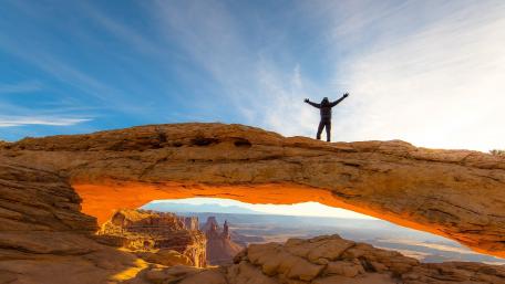 Majestic Arch Under a Serene Sky wallpaper