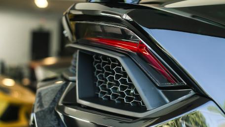 Sleek Car Tail Light Design for Enthusiasts wallpaper