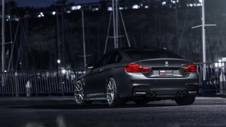 Sleek BMW F30 at Nighttime Marina Scene wallpaper