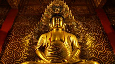 Golden Buddha Amidst Serene Patterns wallpaper