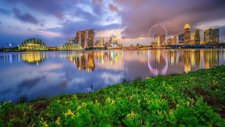 Stunning Cityscape Reflected in Tranquil Waters wallpaper