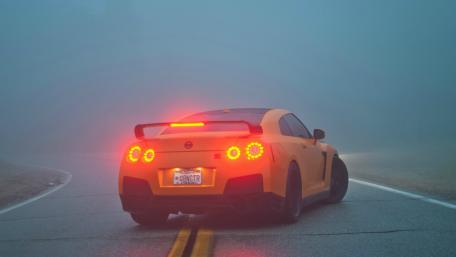 Misty Adventure with a Yellow Sports Car wallpaper