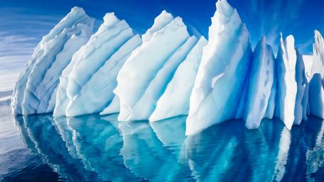 Majestic Iceberg Reflections in Crystal Waters wallpaper