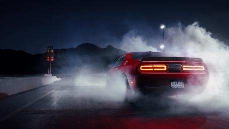 Vibrant Night Drive with a Powerful Muscle Car wallpaper