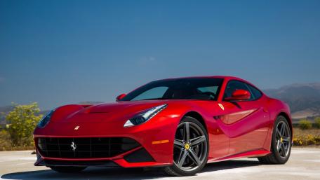 Red Ferrari F12 Berlinetta in Stunning Landscape wallpaper