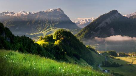 Serene Mountain Landscape in Early Morning Light wallpaper