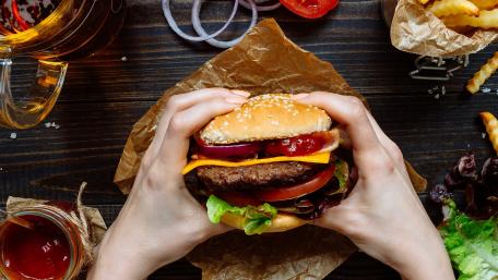 Delicious Burger Enjoyment Moments wallpaper