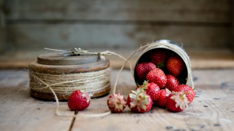 Fresh Strawberries in a Rustic Setting wallpaper