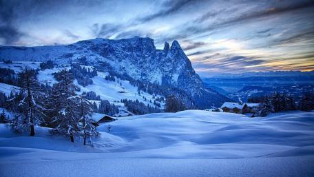 Majestic Winter Landscape of Snowy Mountains wallpaper