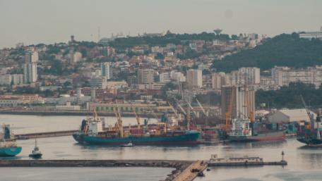 Harbor Cityscape with Ships and Buildings wallpaper