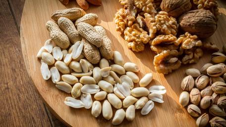 Nutty Delight on a Wooden Platter wallpaper