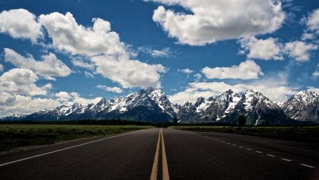 Majestic Mountain Road View in 4K Quality wallpaper