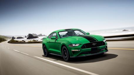 Fierce Green Mustang on Open Road wallpaper