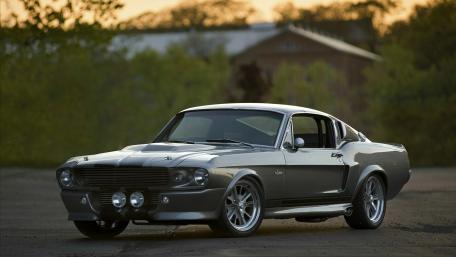 Classic Mustang in Stunning Landscape View wallpaper