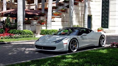 Sleek Ferrari Parked in Luxury Surroundings wallpaper