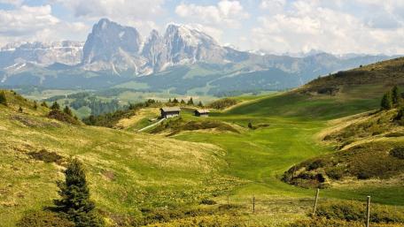 Majestic Mountains and Lush Green Hillsides Inspired by Nature's Beauty wallpaper