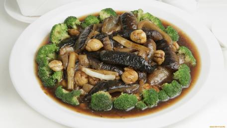 Delicious Stir-Fried Mushrooms and Broccoli Dish wallpaper