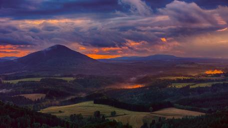 Majestic Sunset Over Serene Hillside Landscape wallpaper