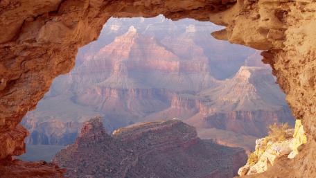 Majestic Grand Canyon View Through a Natural Arch wallpaper
