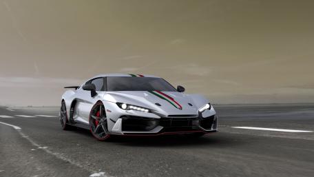 Sleek Silver Supercar on the Open Road wallpaper