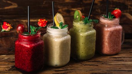 Refreshing Colorful Smoothies in Jars wallpaper