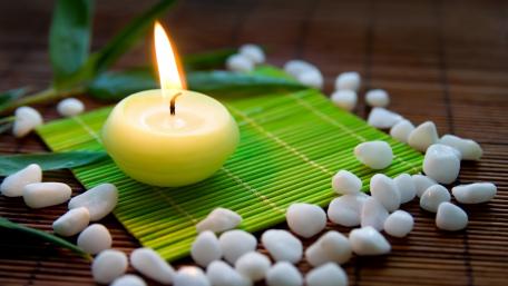 Serenity Awaits with Candlelight and Stones wallpaper