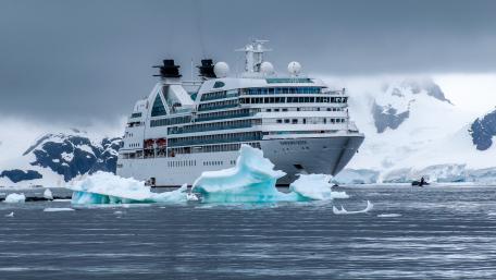Majestic Cruise Ship Among Icebergs in 4K wallpaper