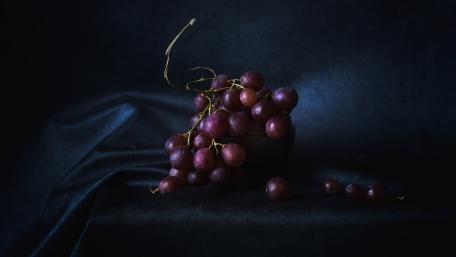 Rich Purple Grapes on Velvet Background wallpaper