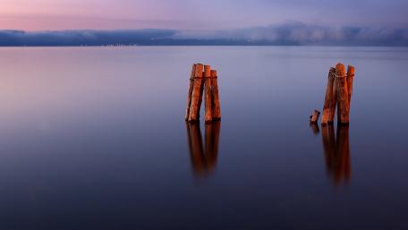 Serene Reflections on Tranquil Waters wallpaper