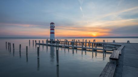 Serene Sunset by the Lighthouse wallpaper