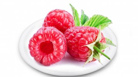 Fresh and Juicy Raspberries on a Plate wallpaper
