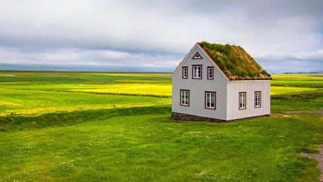 Serene Country Landscape with a Unique House wallpaper