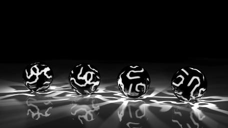Dynamic Black and White Sphere Arrangement wallpaper