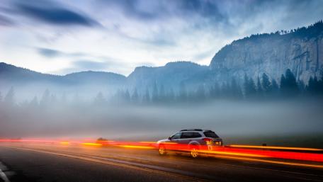 Mountain Drive in Misty Twilight wallpaper