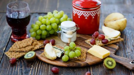 Delightful Spread of Fresh Fruits and Snacks wallpaper