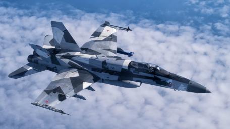 Majestic Fighter Jet in Flight Over Clouds wallpaper
