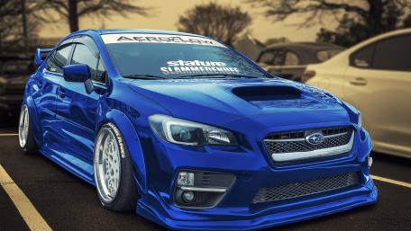 Sleek and Stylish Subaru in Bold Blue Finish wallpaper