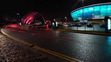 Vibrant City Nightscape with Modern Architecture wallpaper