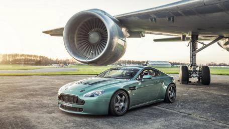 Aston Martin Under Airplane Power wallpaper